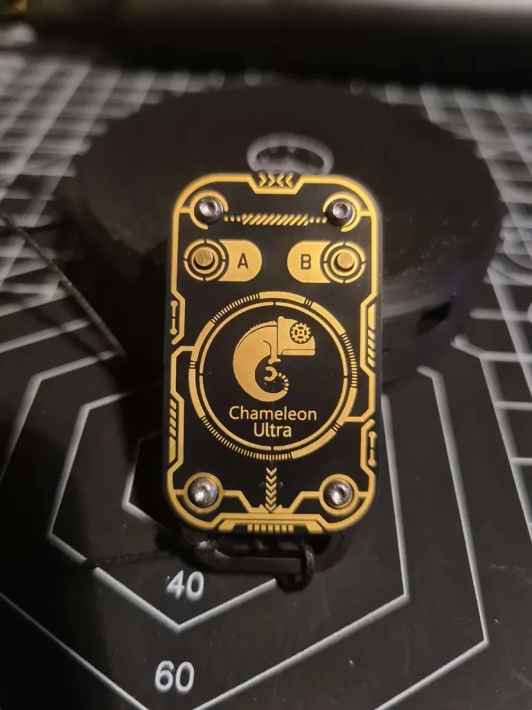 Front of a black and yellow Chameleon Ultra showing its logo and A and B controls